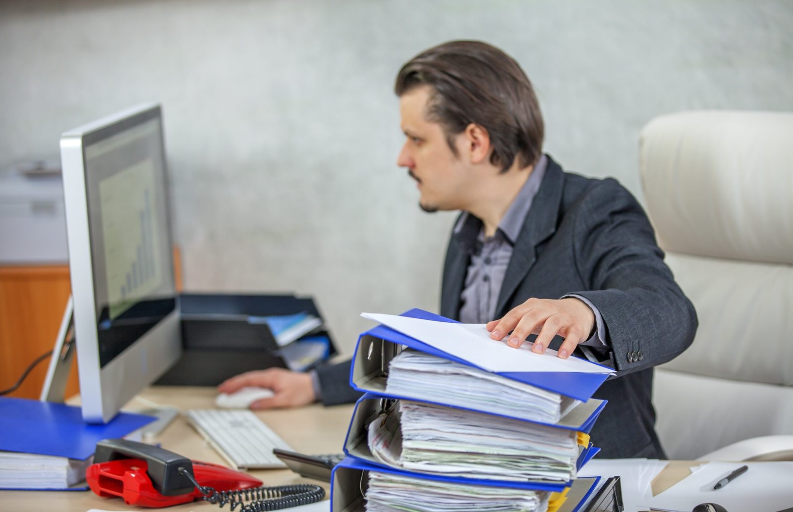 Young Businessman Working From His Office Scaled